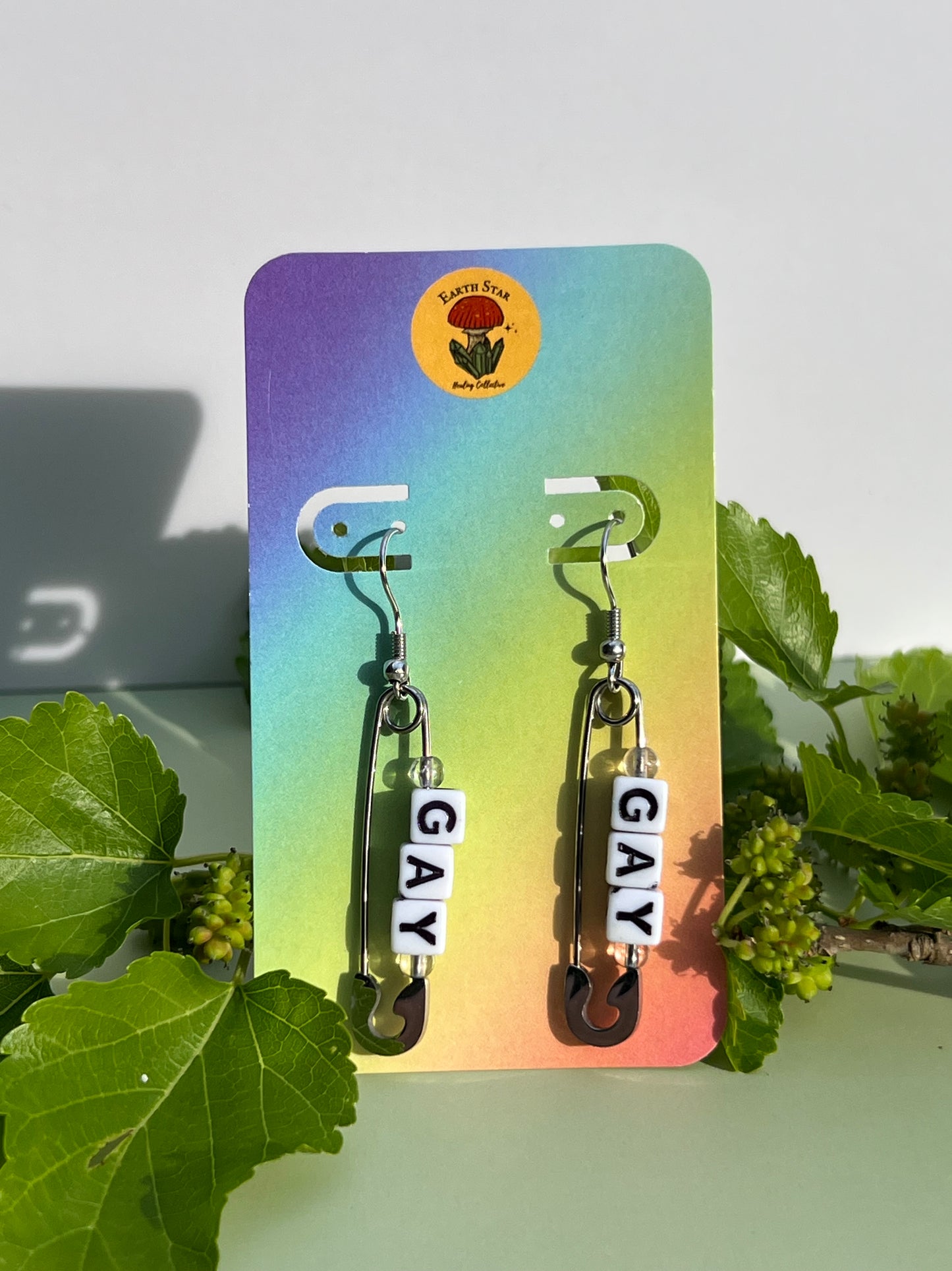 Gay Clear Quartz Pin Earrings