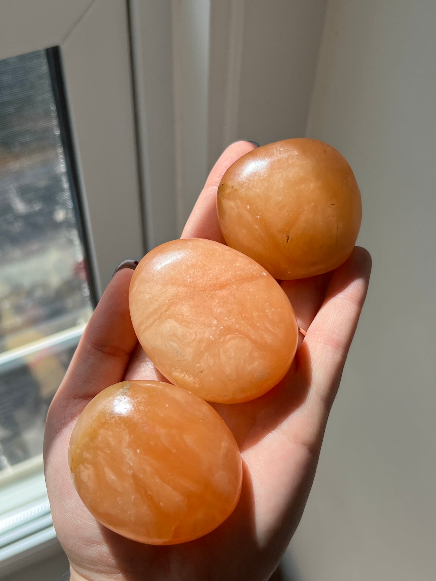 Orange Twist Calcite Palm Stone