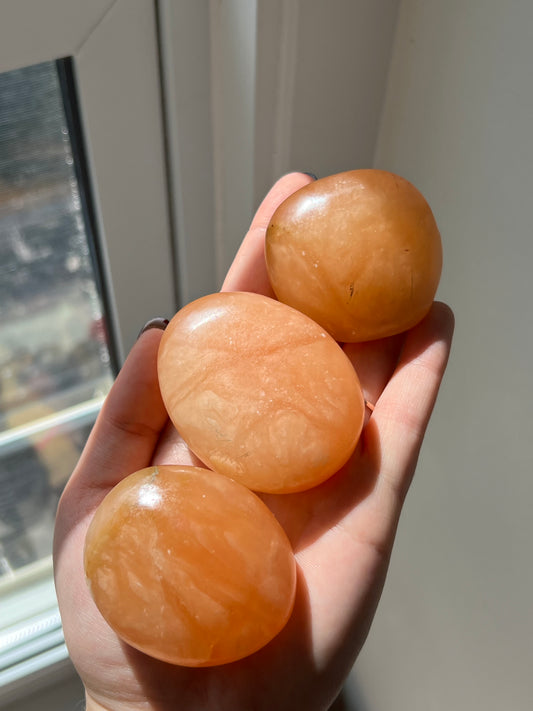 Orange Twist Calcite Palm Stone