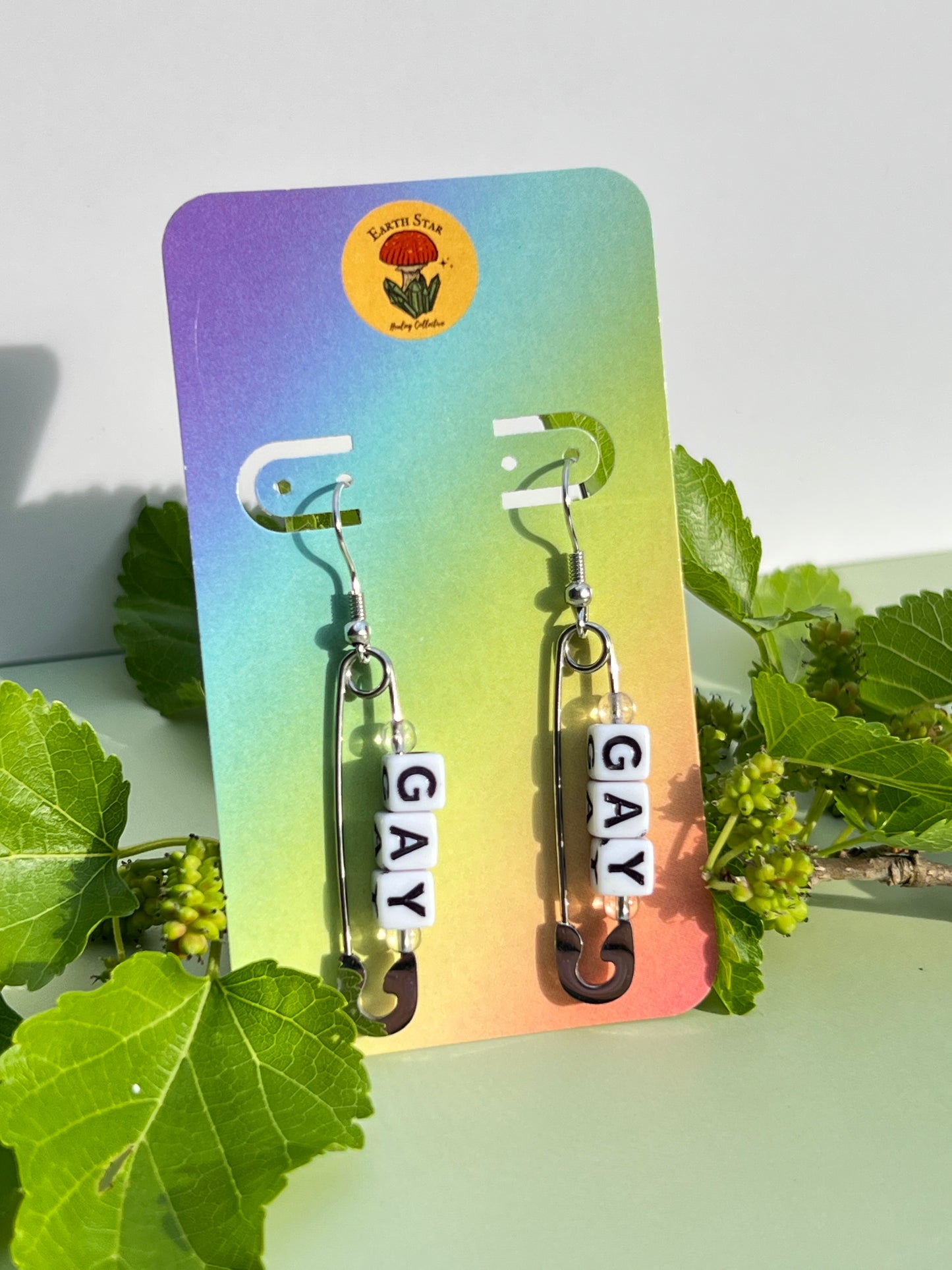 Gay Clear Quartz Pin Earrings