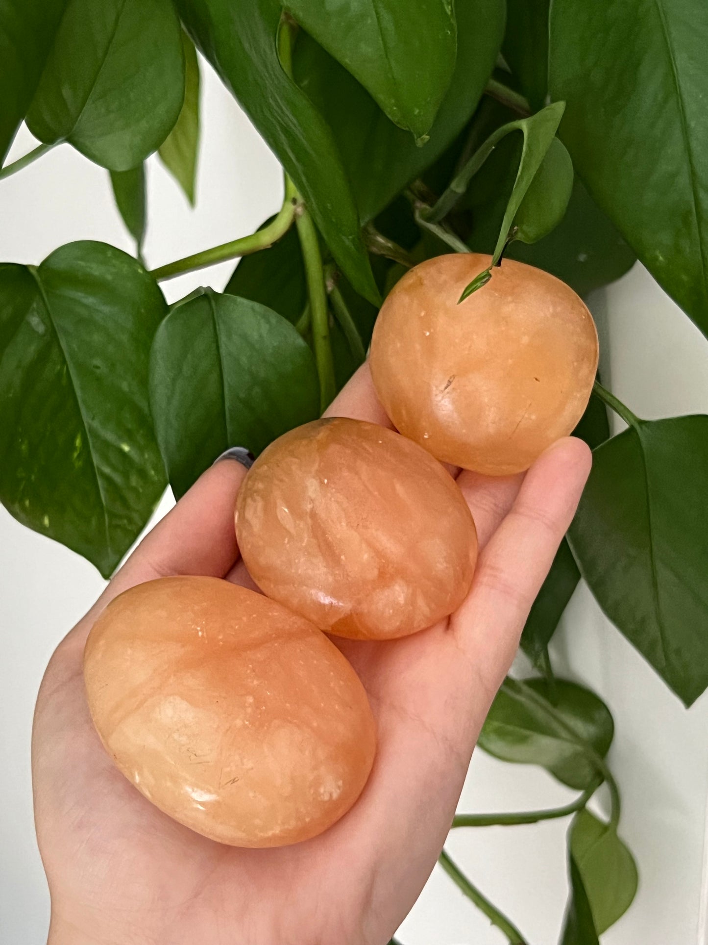 Orange Twist Calcite Palm Stone